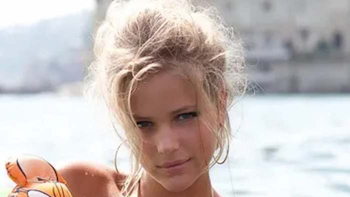 Esti Ginzburg poses in the water off the coast of Naples, Italy.